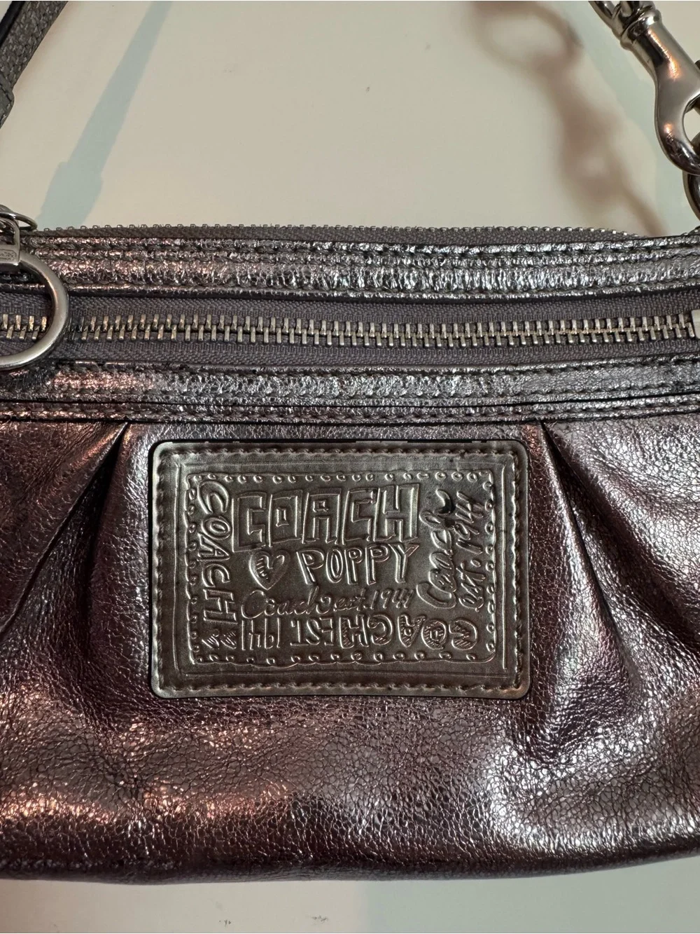 Coach Metallic Pewter Leather Poppy Wristlet
